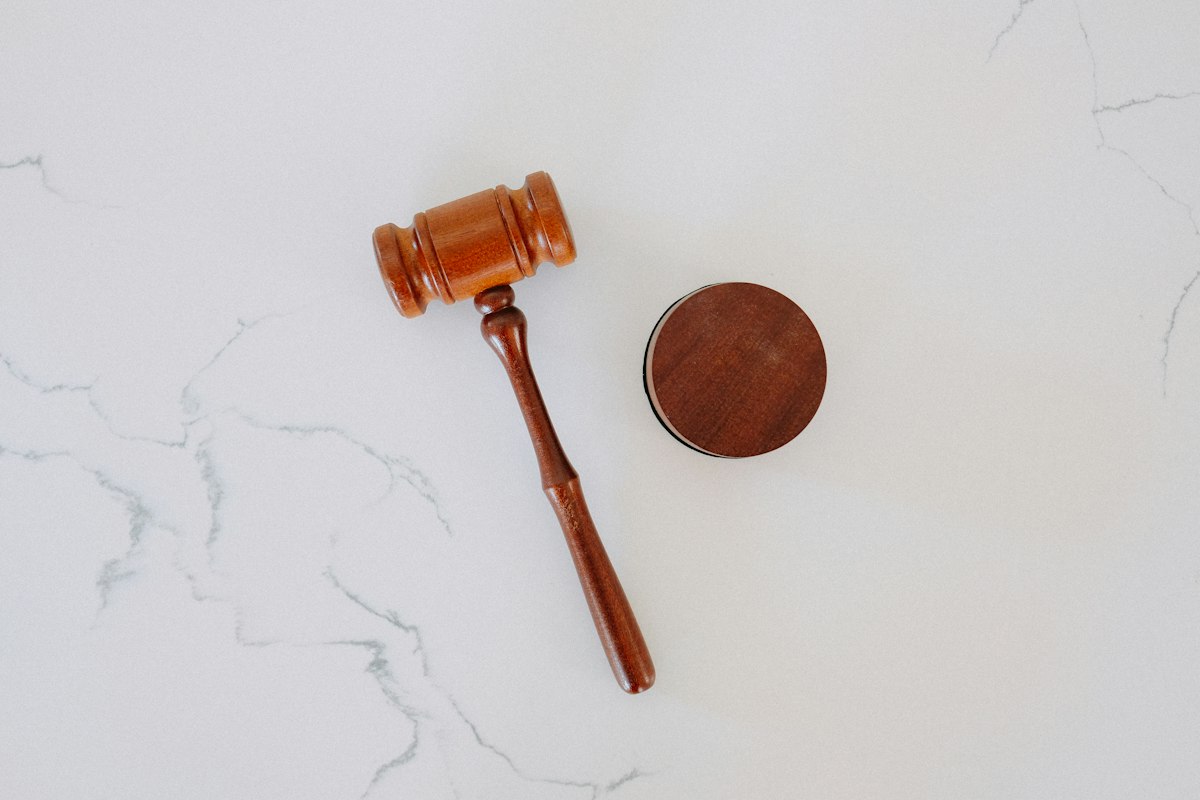 A judge's gavel, representing enforcement proceedings